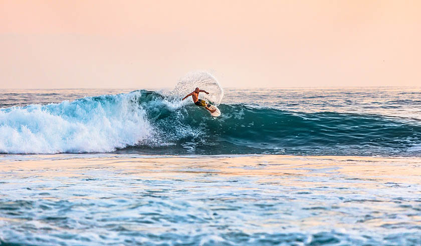 man surfing spi