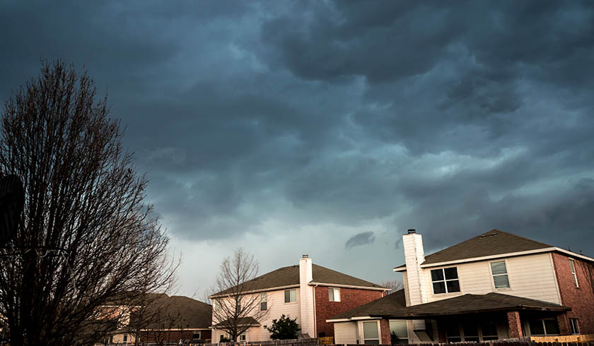 storm clouds over suburbs spi