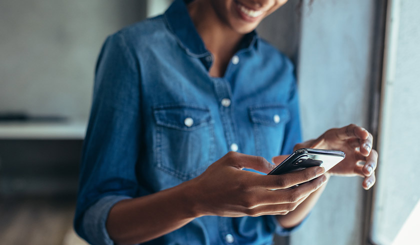 woman using smartphone spi